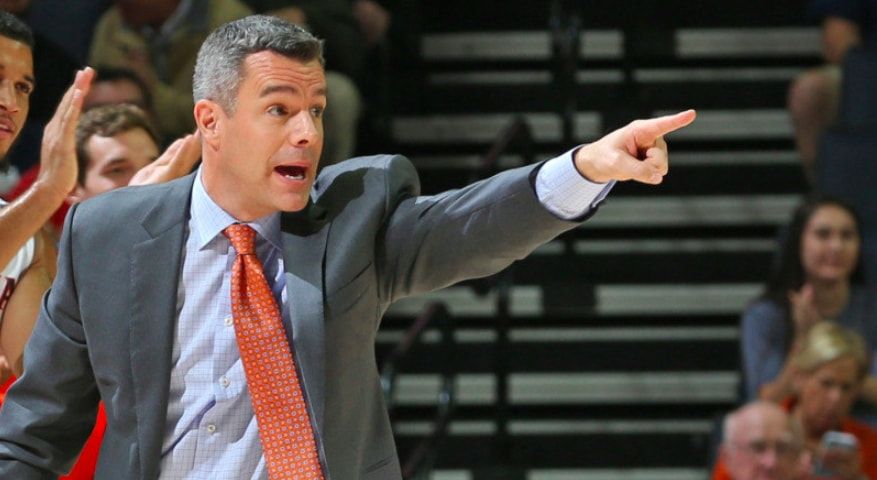 Coach Tony Bennett directing the team from the sidelines.