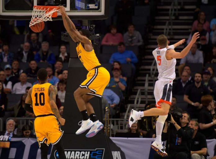 UMBC picked apart the UVa defense the last few minutes for easy baskets like this dunk.