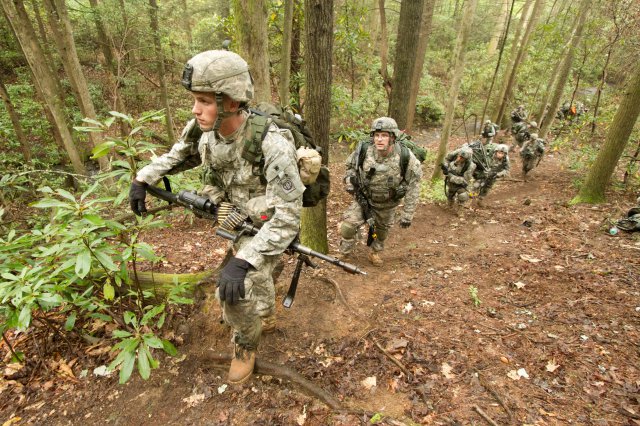 Paratroopers training in the mountains to prepare for combat.