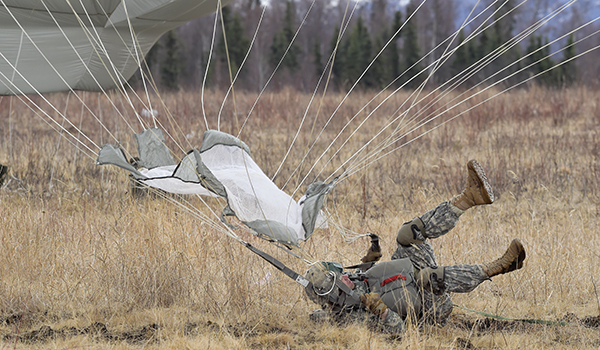 Paratroopers practice landing to get ready for the real thing. (U.S. Air Force photo/Alejandro Pena)