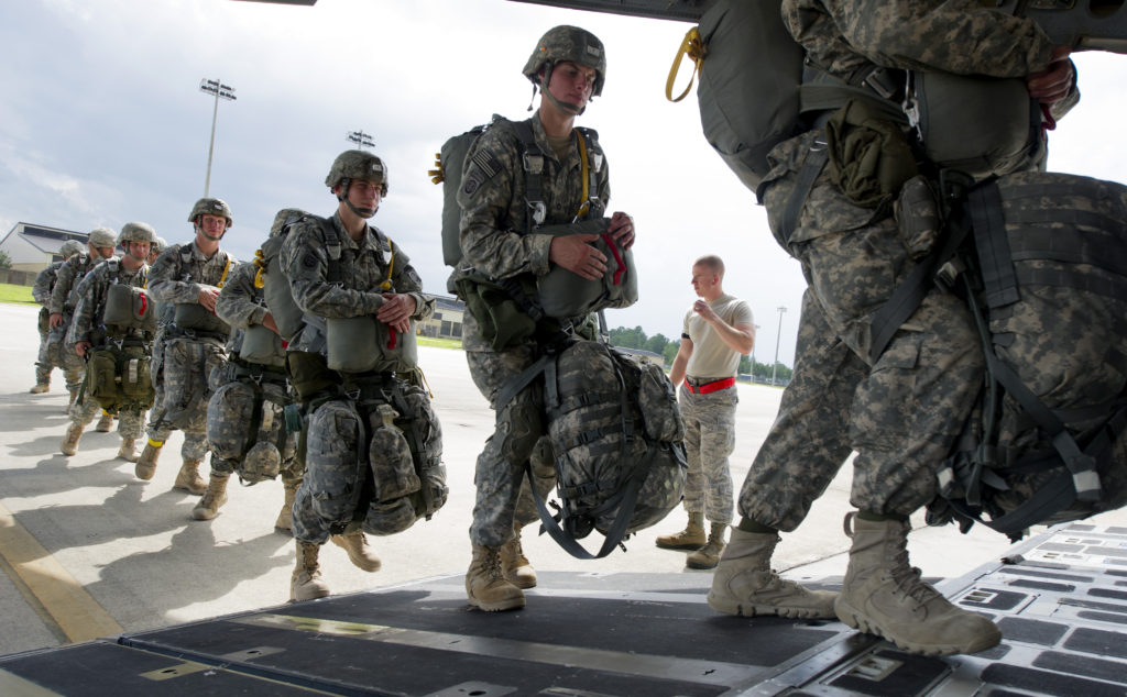 Paratroopers loading the plan for a jump with full equipment. (U.S. Air Force photo by Tech. Sgt. Bradley C. Church/Released)